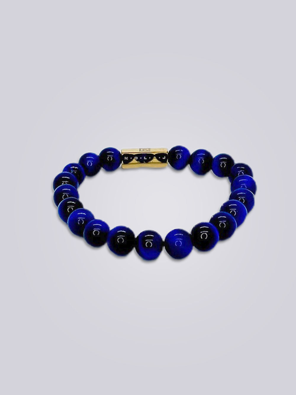 Blue tiger eye gemstone bracelet . blue cheapest tiger eye and gold beaded bracelet . nickel free jewelry . gemstone jewelry . gemstone bracelet .